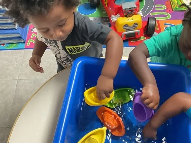 Young child participating in a sensory activity